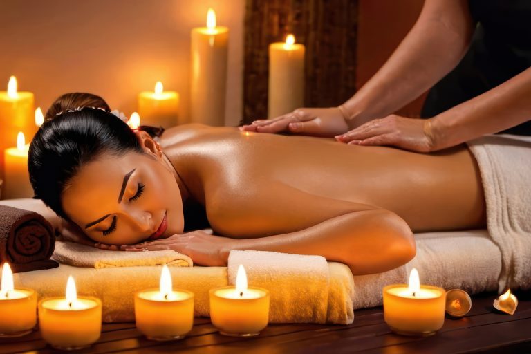 Beautiful woman receiving back massage in beauty spa salon. Beauty treatment concept