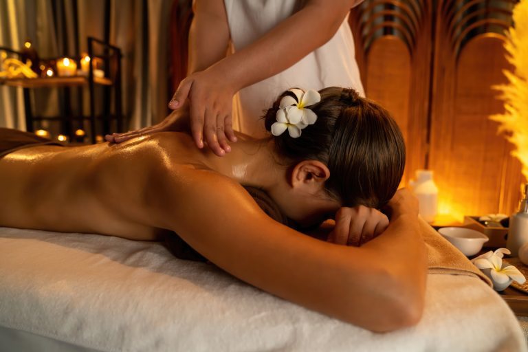 Caucasian woman customer enjoying relaxing anti-stress massage